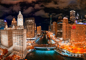 Aerial view of Chicago night skyline. Skyscrapers over Chicago River, Illinois