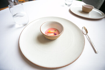 white plate with spoon and fork