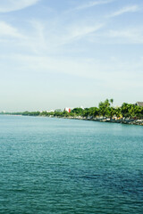 Obraz premium Empty beach and city on the beach,blue sea and view of nice tropical in summer time and sunny.