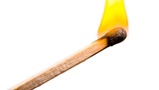 Burning matchstick with yellow flame isolated on a transparent background fire ignition