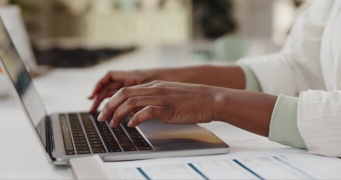 Person, hands and typing with laptop in home for research, financial planning or expenses. Closeup, freelancer or remote work with documents on computer for online finance, invoices or bills in house