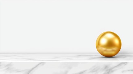 A shiny gold sphere sits on a white marble shelf.