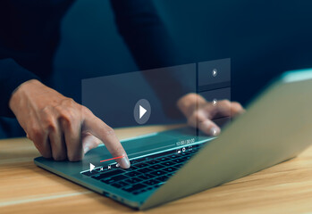 Man using internet technology, using internet to connect with media, video chat, doing business,...