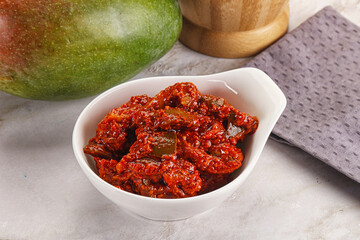 Spicy pickled raw green mango
