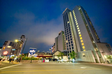 Niagara Falls, Canada - August 5, 2024: Downtown Niagara Falls streets and buildings at night in...