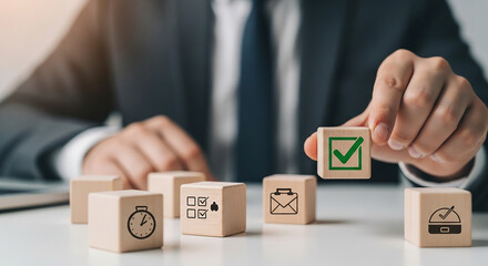 Businessman placing cube with approval icon in row representing business decision project completion planning and productivity execution
