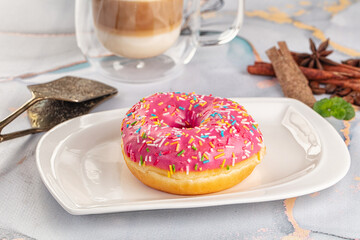 Sweet donut with strawberry icing