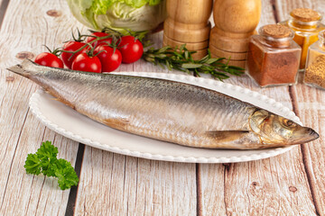 Raw whole salted herring fish