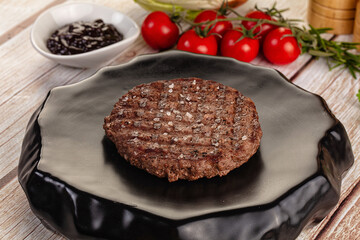Grilled juicy beef cutlet for burger