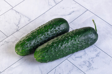 Ripe green raw two cucumbers