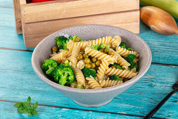 Italian vegan pasta fusilli with broccoli