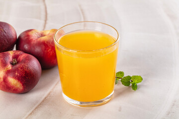 Vitamin beverage - peach juice glass