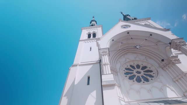 Arched facade of Neo-Gothic Catholic church architecture PAN UP