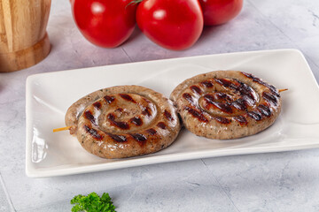 Grilled beef round circle sausages