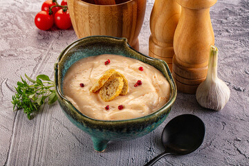 Tasty cheese cream soup with crouton