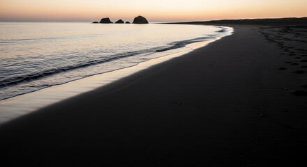 Black sand beach with calm ocean, soft lighting, minimal and peaceful scene