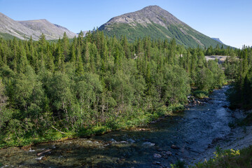 The Kuniyok River in a mountain landscape. Khibiny, Murmansk region, Russia