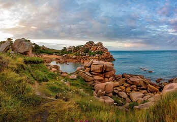 The beautiful colorful coast of Brittany at sunset, pink granite coasts, between Perros-Guirec and...