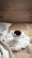 cup of coffee on a simple background, cozy home, notebook and coffee, coffee beans, flatlay, background