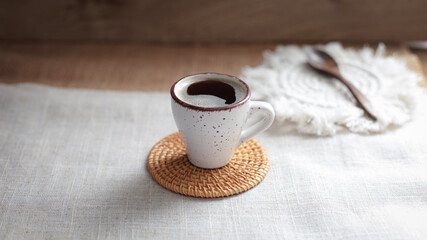cup of coffee on a simple background, cozy home, notebook and coffee, coffee beans, flatlay, background