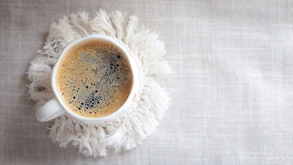 cup of coffee on a simple background, cozy home, notebook and coffee, coffee beans, flatlay, background