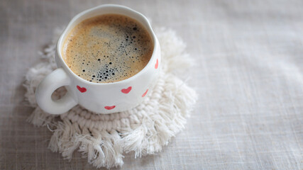 cup of coffee on a simple background, cozy home, notebook and coffee, coffee beans, flatlay, background