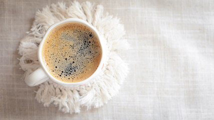 cup of coffee on a simple background, cozy home, notebook and coffee, coffee beans, flatlay, background