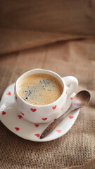 cup of coffee on a simple background, cozy home, notebook and coffee, coffee beans, flatlay, background
