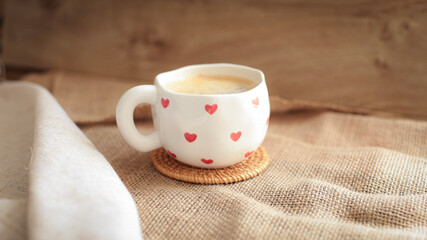 cup of coffee on a simple background, cozy home, notebook and coffee, coffee beans, flatlay, background