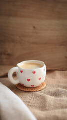 cup of coffee on a simple background, cozy home, notebook and coffee, coffee beans, flatlay, background