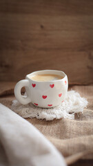cup of coffee on a simple background, cozy home, notebook and coffee, coffee beans, flatlay, background