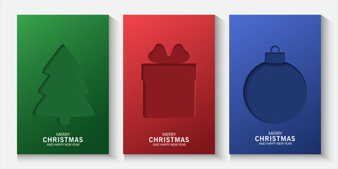 Christmas banner with cutout designs on blue, green, red background. Christmas minimal poster ,flayes, cards with Xmas tree, ornament ball, gift box, snowflakes inside shadow, merry Christmas for ads.