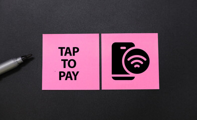 tap to pay word concept with icon top view paper on office work