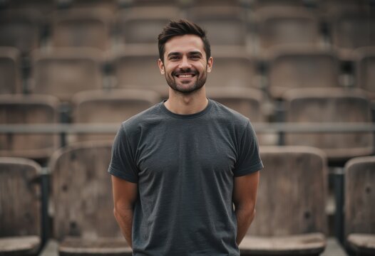 Sound engineer smiling confidently at an outdoor amphitheater