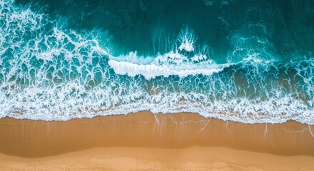 Minimalist Aerial View of a Blue Ocean Wave Breaking on a Sandy Beach