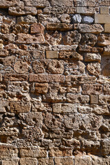 Background texture of old crumbling stone wall