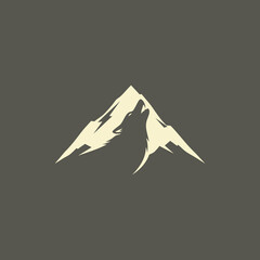 Wolf Mountain Logo Design – A bold design showing a howling wolf silhouette inside mountain peaks, symbolizing wilderness, adventure, and strength