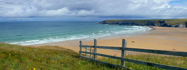 Elevated panorama of 'Holywell Bay' rugged awe inspiring beach in Cornwall