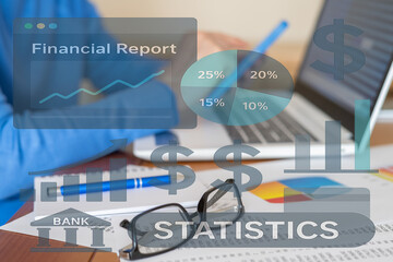 Financial analyst working diligently at a laptop, analyzing statistics, charts, and financial reports to assess company performance and track progress towards key objectives