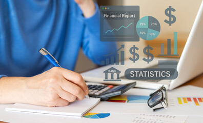 Businesswoman analyzing financial statistics and kpis on a laptop while evaluating a report that highlights positive sales growth and company progress