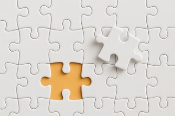 Fototapeta premium Close-Up of White Puzzle Pieces with One Missing Piece and an Individual Piece on a Yellow Background