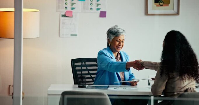 Business woman, handshake and client with documents for application or registration in office. Female person, accountant or financial advisor shaking hands with applicant for loan agreement or deal - Powered by Adobe
