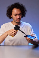 The Innovative Smartphone Cleaning Device is Being Demonstrated During Use and Functionality