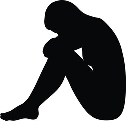 Silhouette of a Woman Sitting Alone Feeling Sad and Depressed