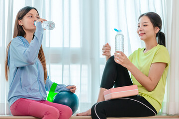 Diverse Group of Female Friends Resting After Workout