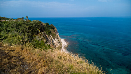 Cliffside Vegetation and Turquoise Waters – Aerial View of Mediterranean Coastline in Calabria, Italy