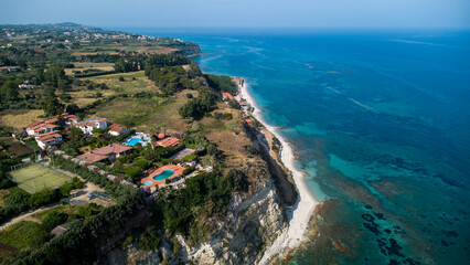 Coastal Resort with Villas, Pools, and Tennis Court – Aerial View of Holiday Complex in Calabria, Italy