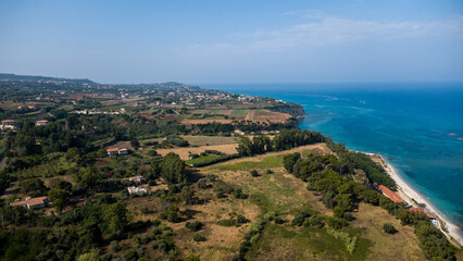 Agricultural Fields, Coastal Town, and Turquoise Sea &ndash; Aerial View of Mediterranean Landscape in Calabria, Italy