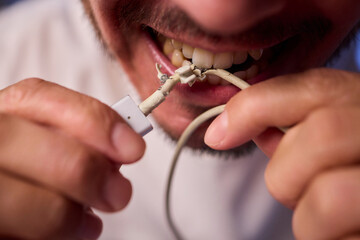 Carefully Repairing a Damaged Charging Cable with Skillful Hands for Best Results and Safety