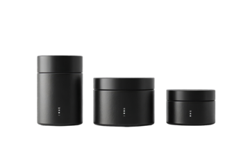 Three matte black cylindrical jars of varying sizes